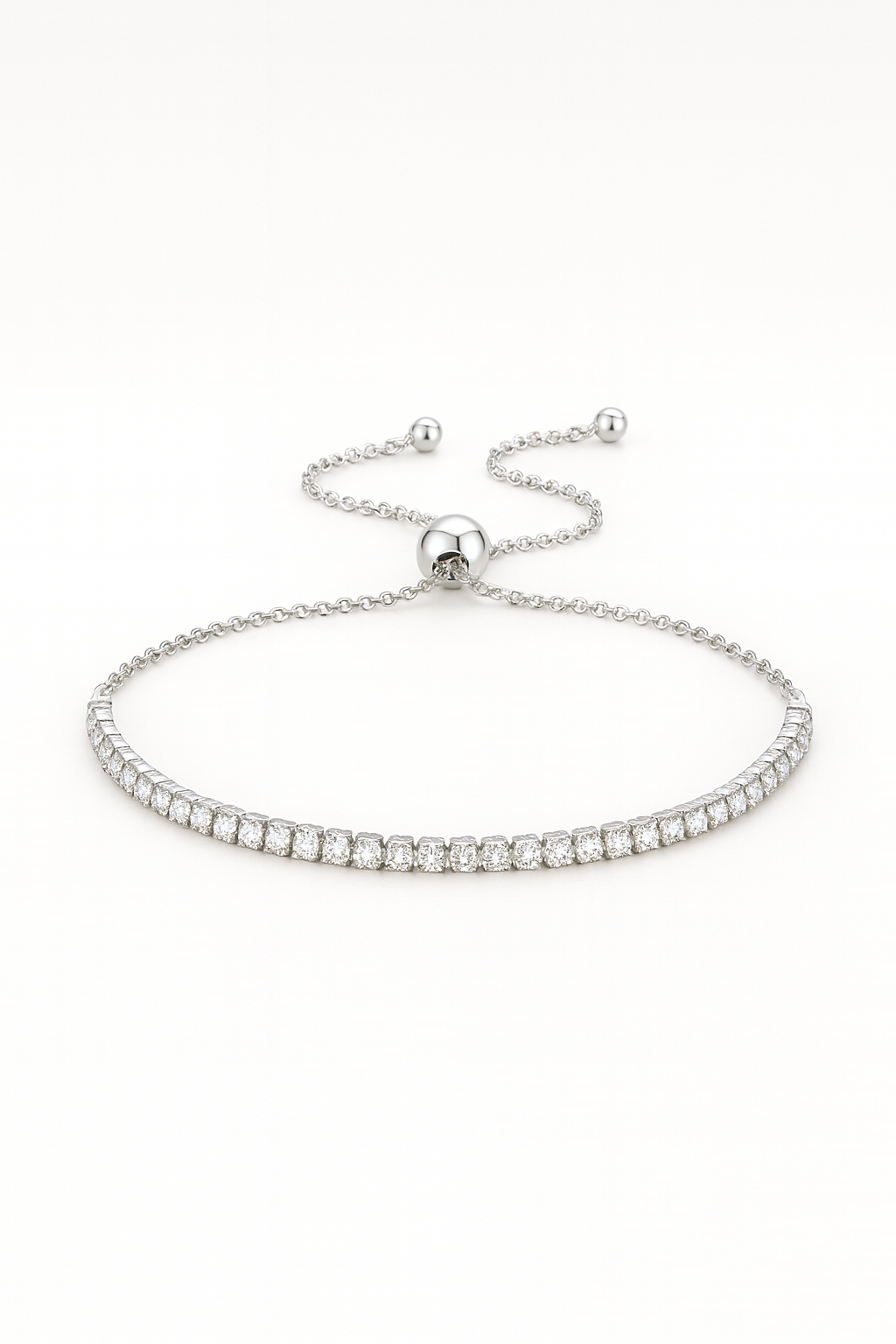 Silver bracelet with small beads on a white background